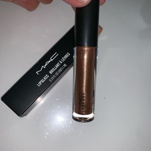 Mac lipglass in color oh baby NEVER USED